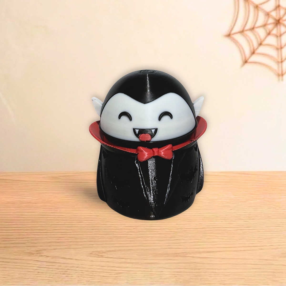Vampire Halloween holder with red bow tie and cape