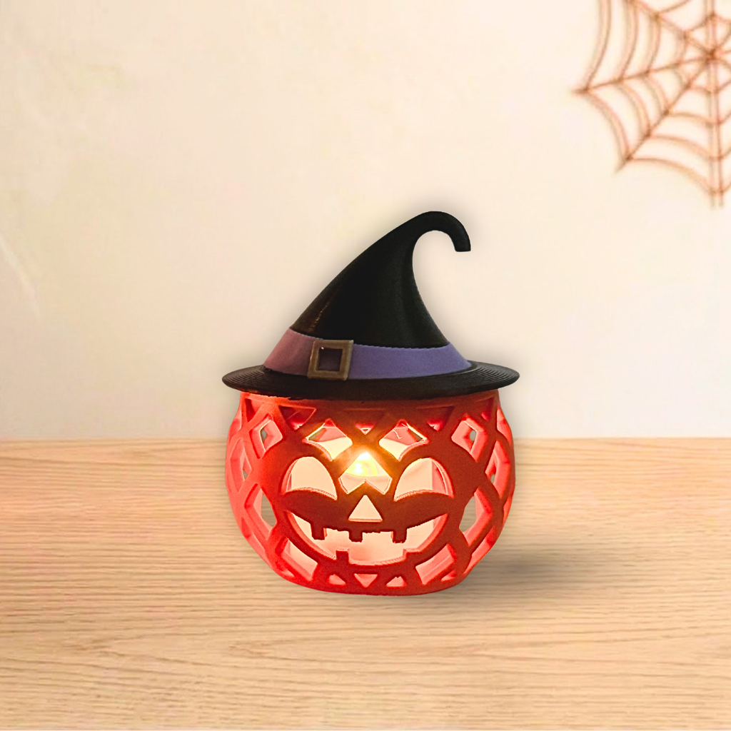 Witch Pumpkin holder glowing with an LED tea light