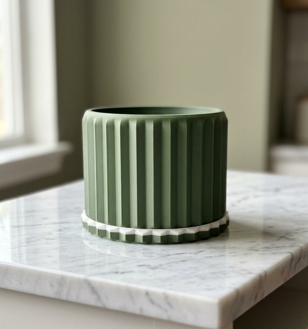Matte olive green Ridgeline succulent planter with white accent rim drip tray