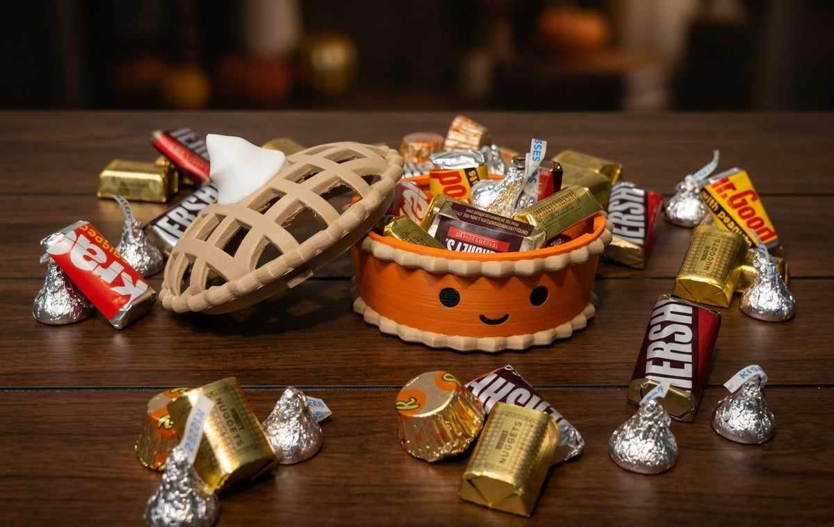 Pumpkin Pie holder with lattice lid open, filled with wrapped candy