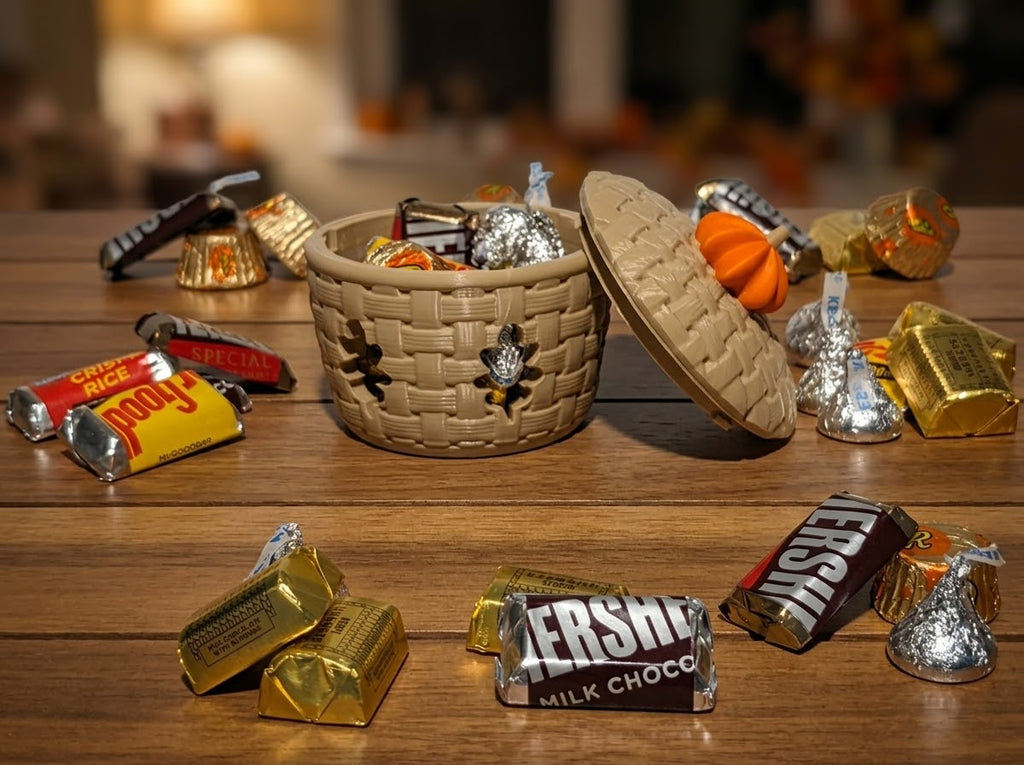 Pumpkin Basket holder with pumpkin-topped lid, filled with candy