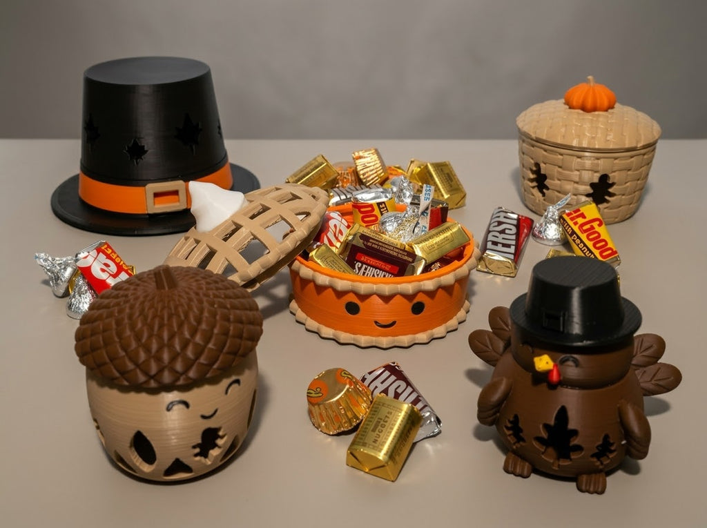 Five 3D printed Thanksgiving candy holders: Pilgrim Hat, Pumpkin Pie, Pumpkin Basket, Acorn and Turkey with wrapped candy