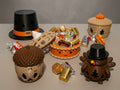Five 3D printed Thanksgiving candy holders: Pilgrim Hat, Pumpkin Pie, Pumpkin Basket, Acorn and Turkey with wrapped candy