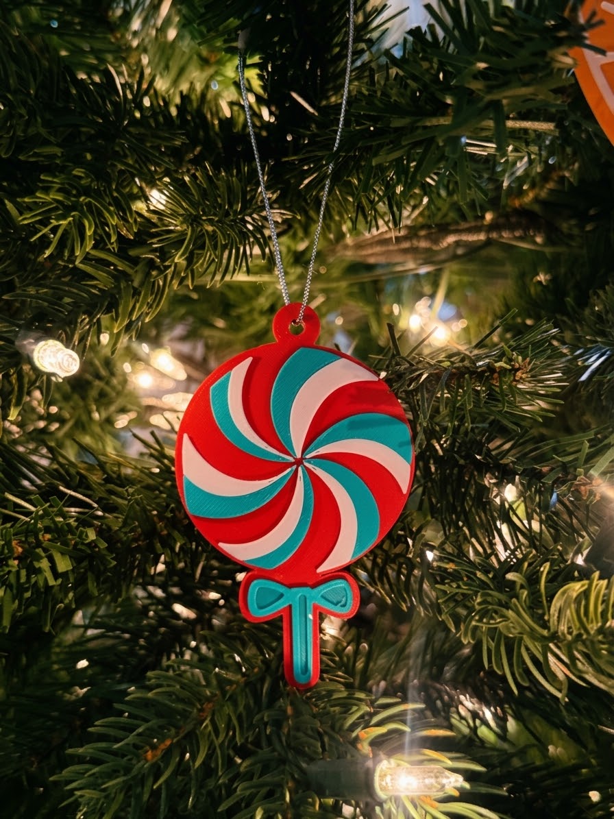 Red, white and teal swirl lollipop ornament